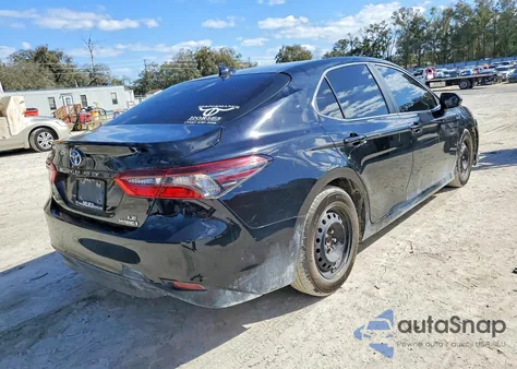 2021 Toyota Camry Hybrid Le from USA, damaged, VIN 4T1C31AKXMU563772